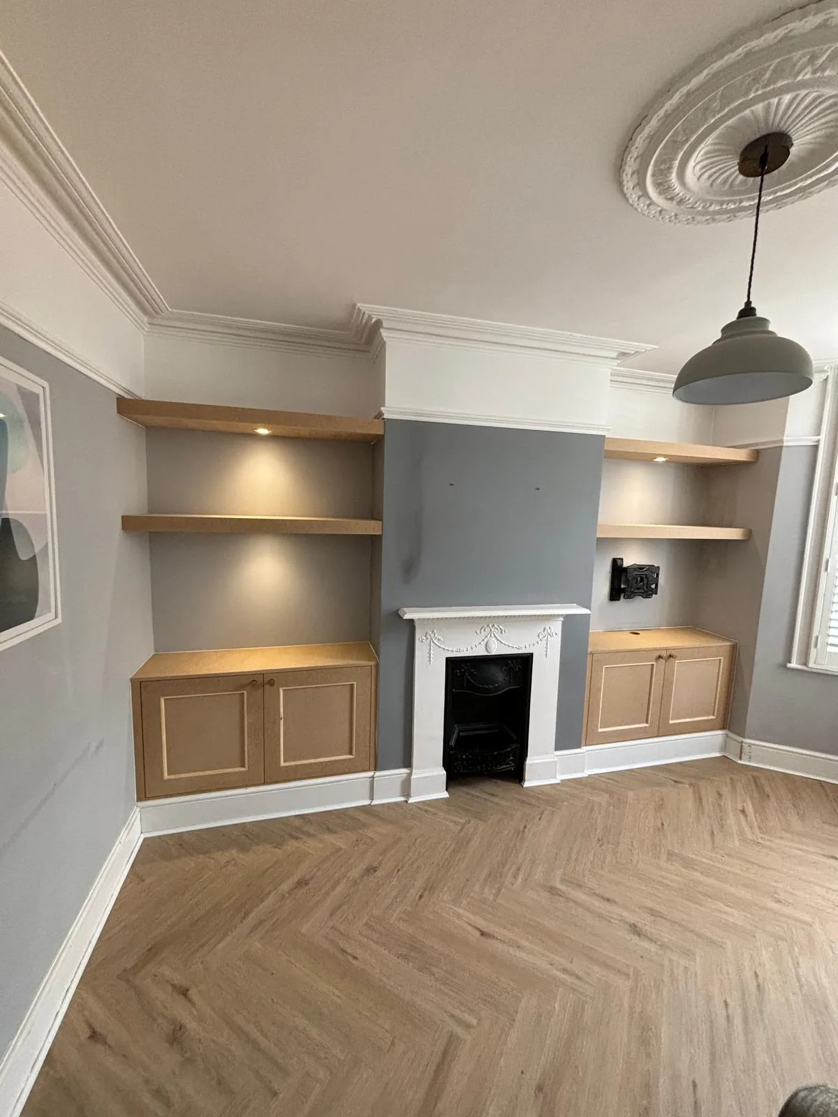 Finished fitted shelving and cupboards by RT Carpentry