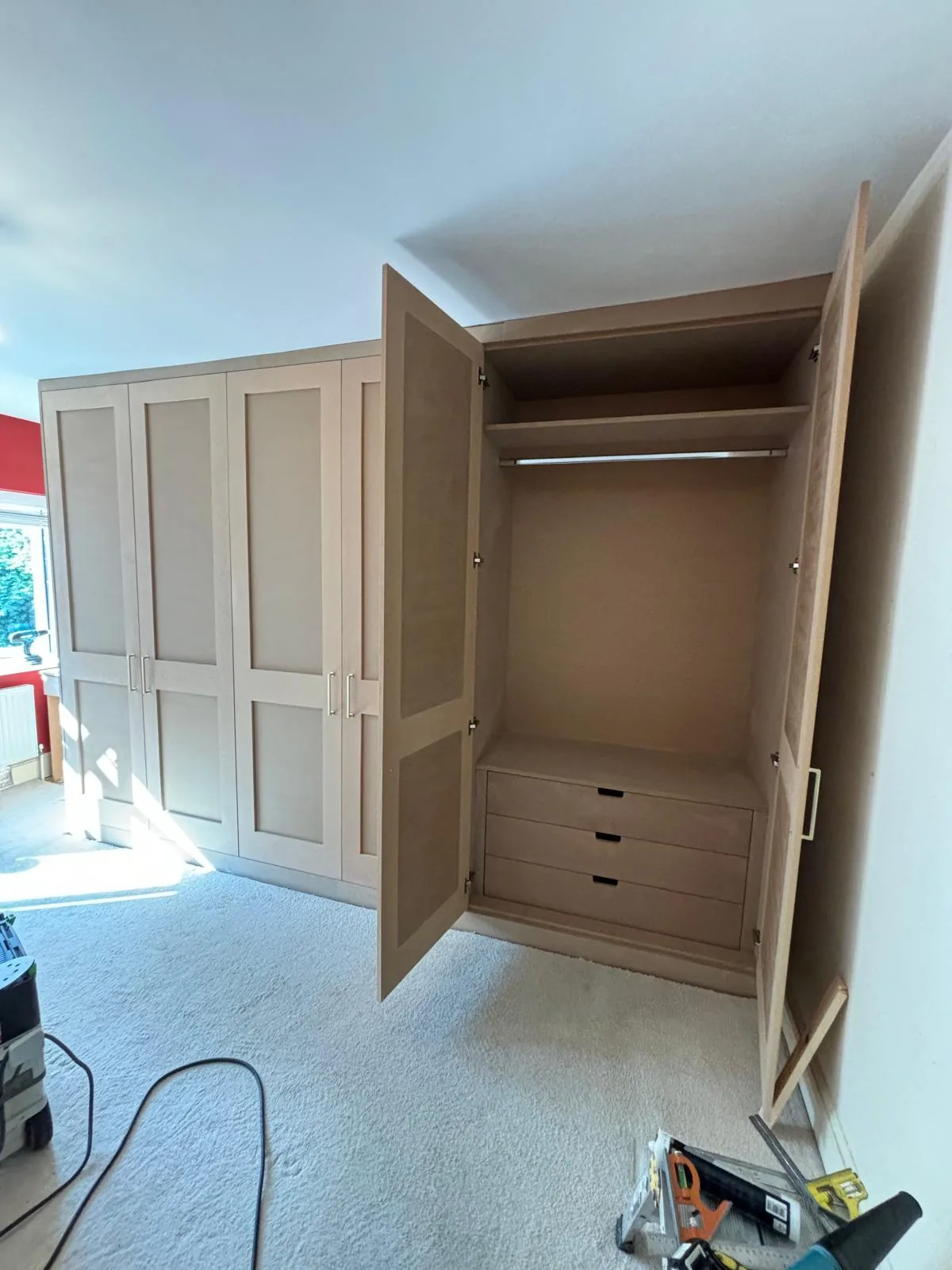 Made-to-measure fitted wardrobe interior by RT Carpentry