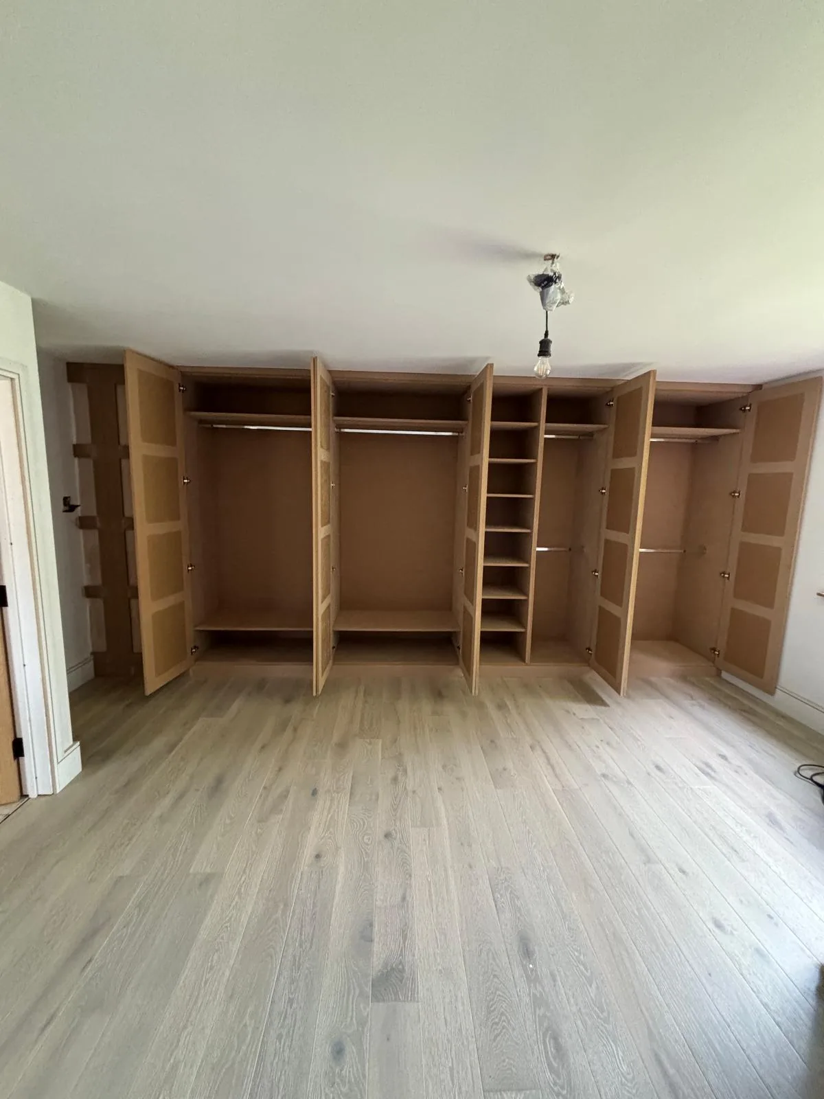 Large fitted wardrobe interior by RT Carpentry