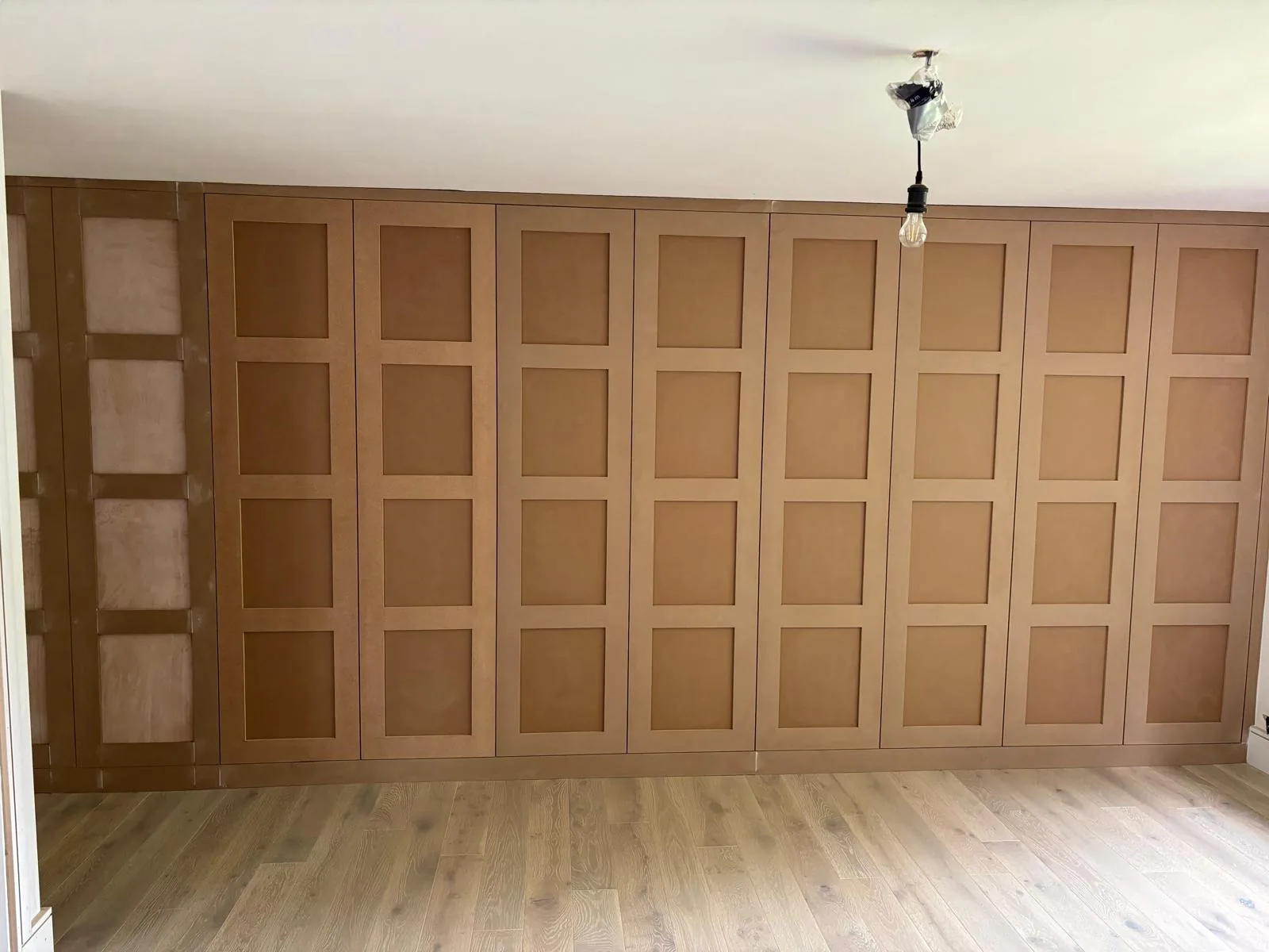 Full-width fitted wardrobes by RT Carpentry